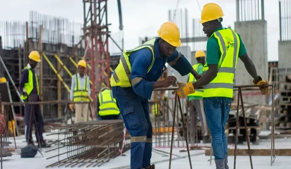 Site engineers reviewing development progress, representing the project timeline of Embassy Knowledge Park