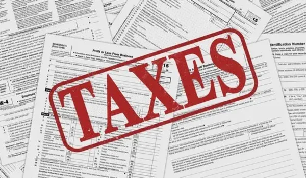 Tax documentation paperwork representing GST, stamp duty and registration charges applicable to a property purchase